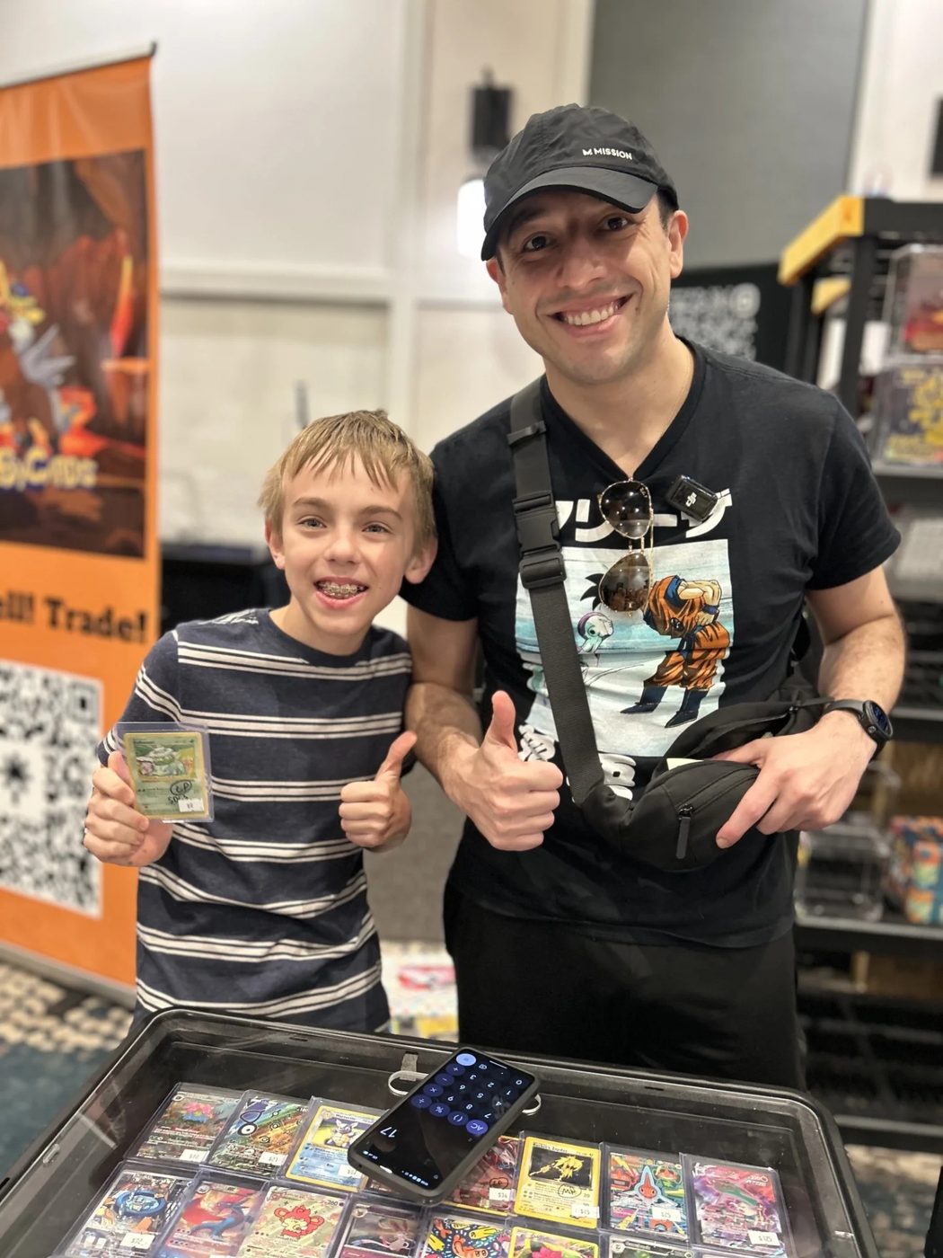 Customer thumbs-up moment at the Sake Kitty booth