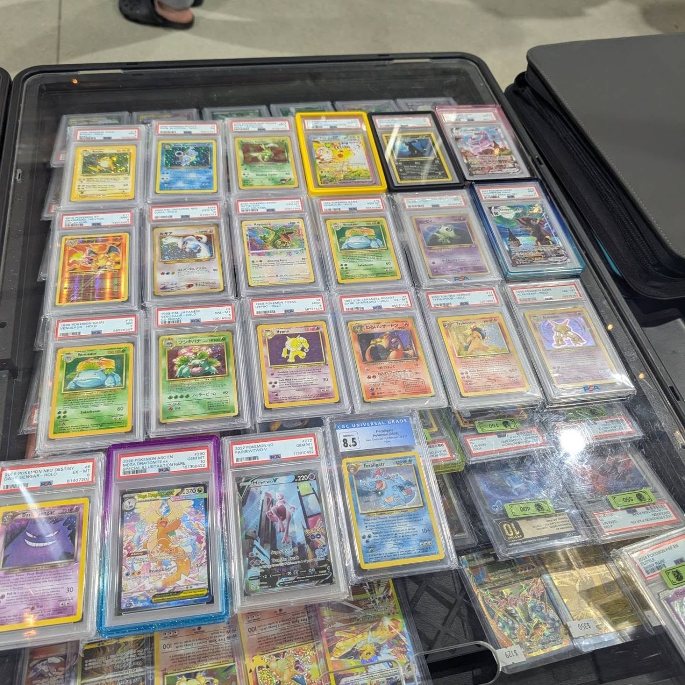 Display tray of vintage graded Pokemon slabs